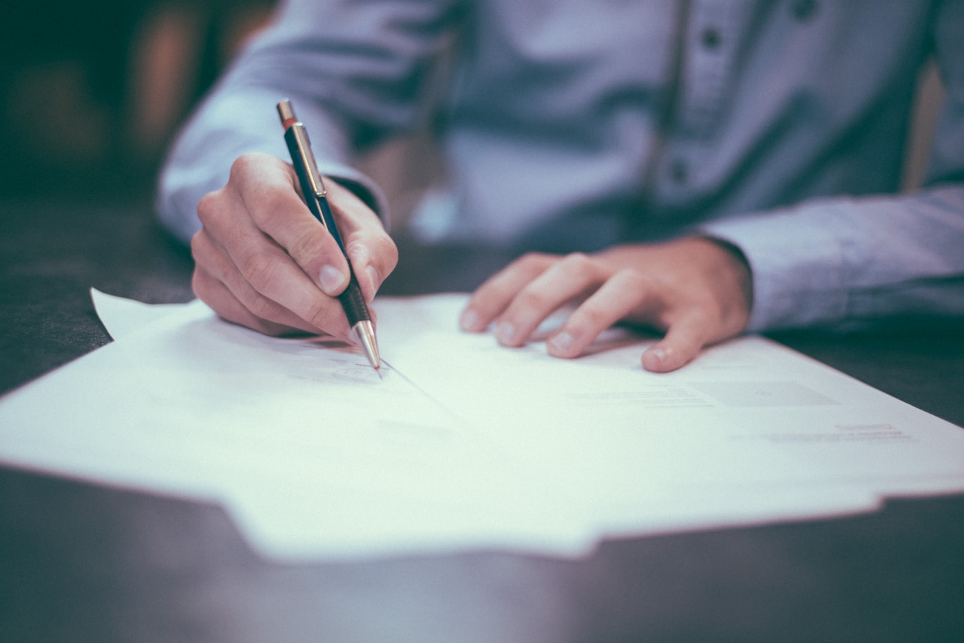 Regulatory dossier and partner documents on a desk